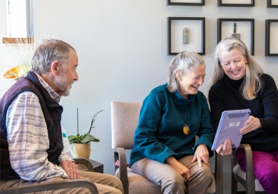 Elderly Couple talking to friend